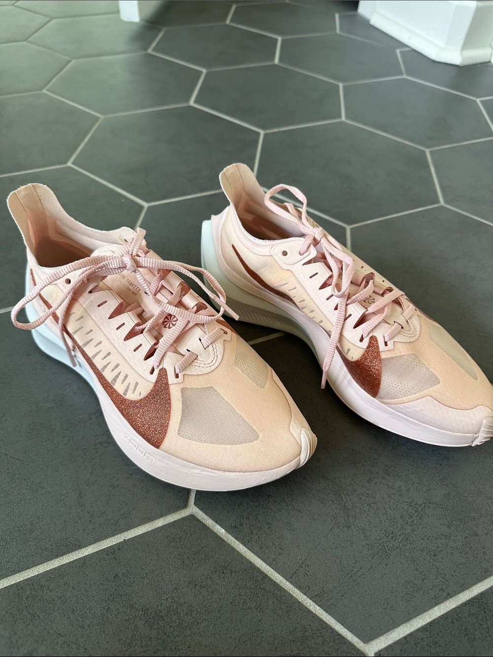 Nike Women's Pink Running Shoes with Rose Metallic Swoosh